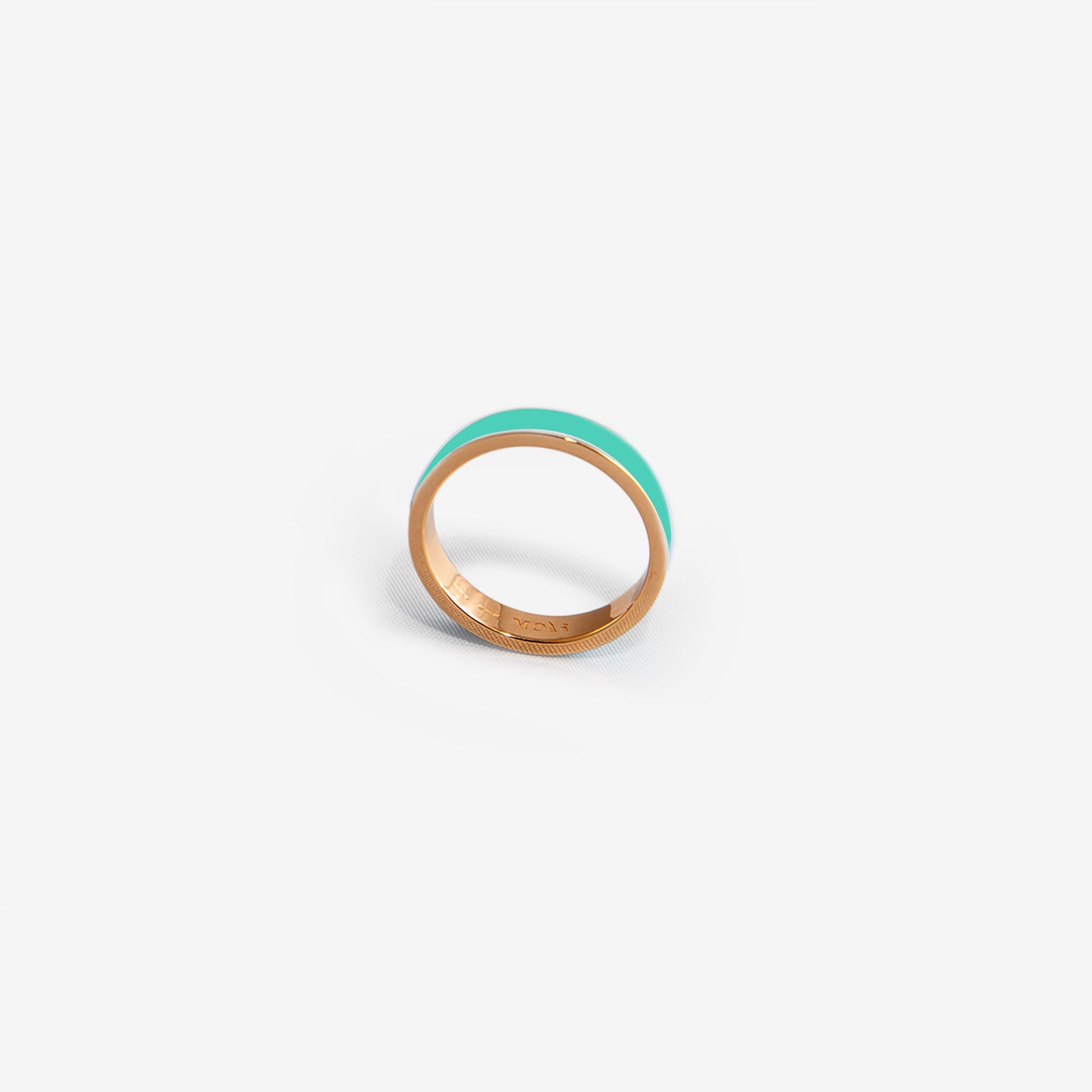 Rose gold band ring and turquoise enamel