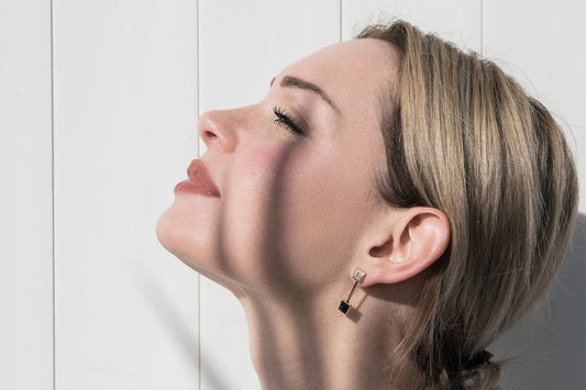 Earrings in rose gold, black onyx and diamonds