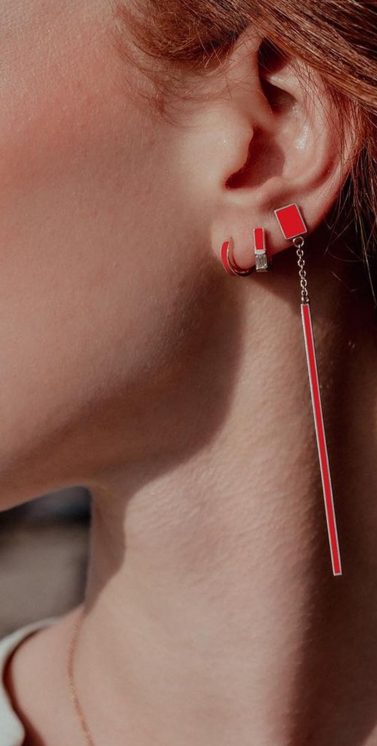 Floating red drop earring