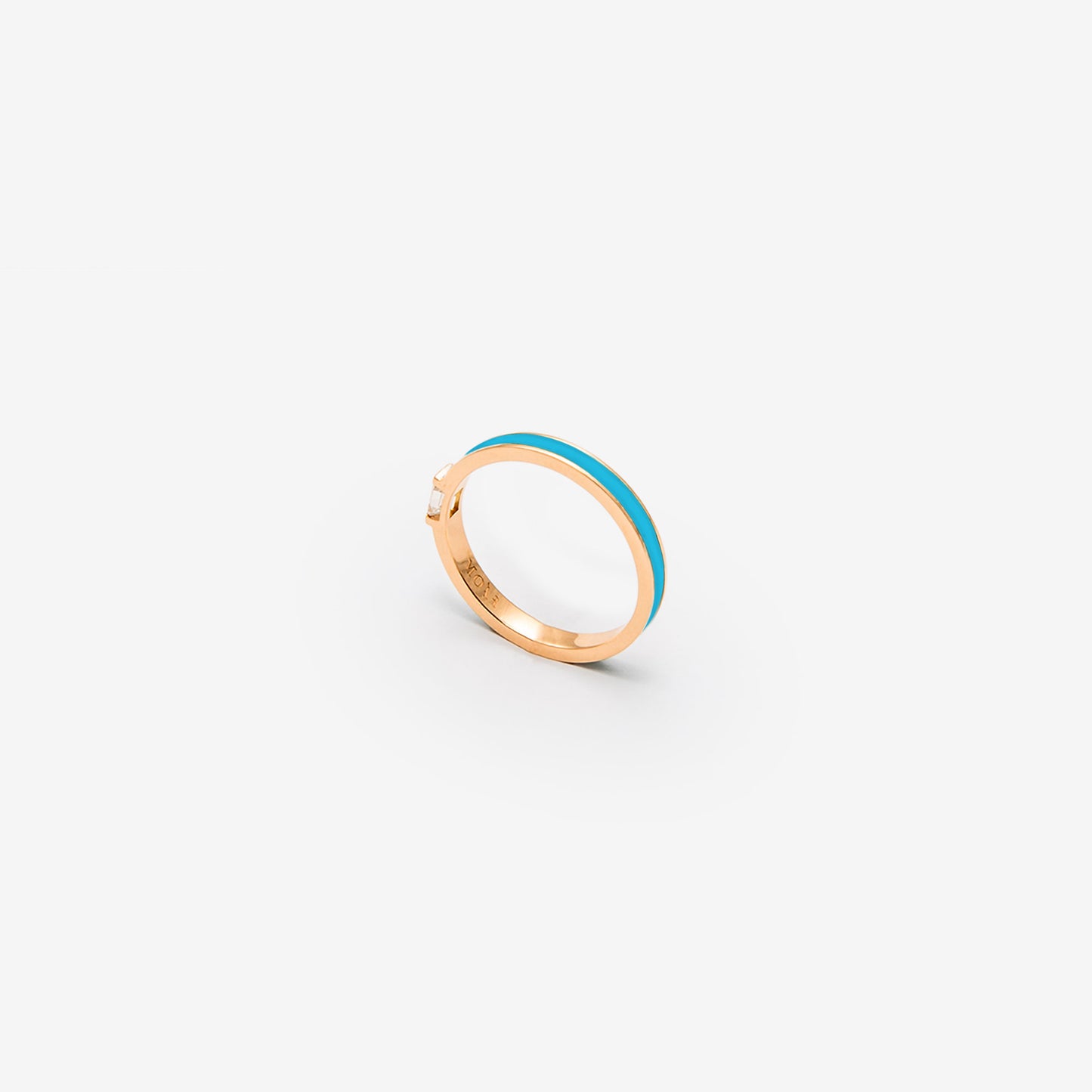 Rose gold band with light blue enamel and a diamond
