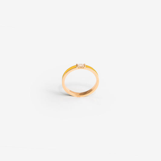 Rose gold band with yellow enamel and a diamond
