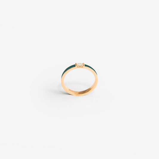 Rose gold band with petroleum blue enamel and a diamond