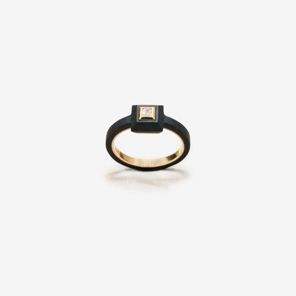Ring made of titanium, rose gold, and diamonds